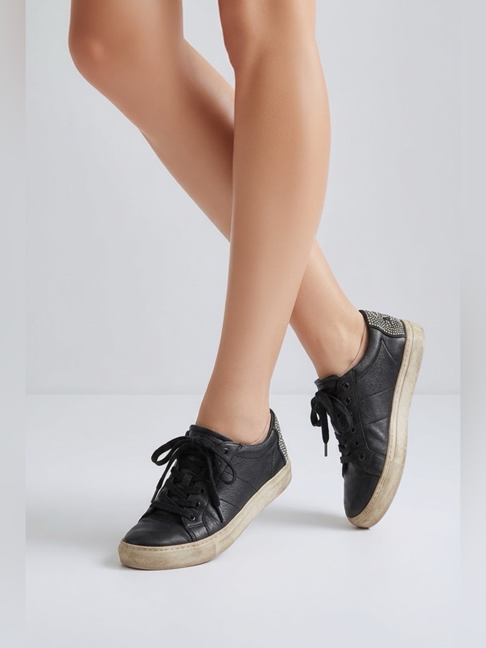 Steve Madden Black Leather Low-Top Sneakers with Studded happy face Heel